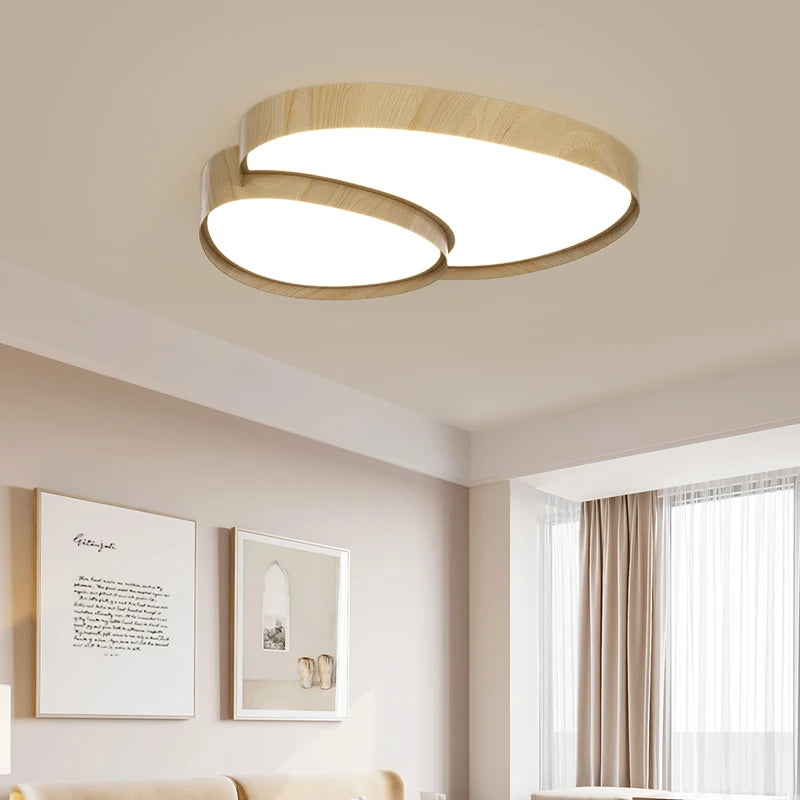 LED-Deckenleuchte in Kieselform in Natur im Wohnzimmer